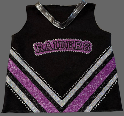 Black tank top with purple and gray striped design and 'RAIDERS' text on a textured surface
